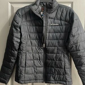 Woman’s medium puff winter jacket by Columbia.